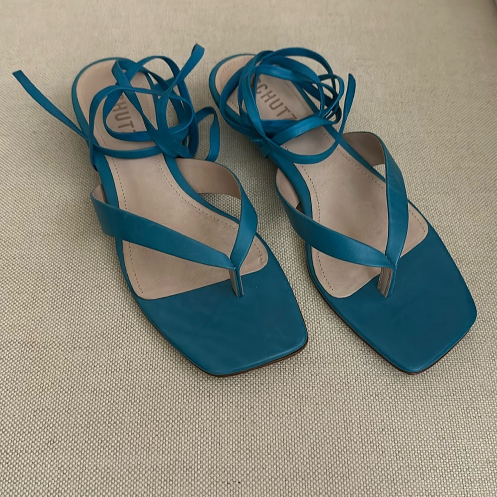 Schutz blue thong sandal with wrap around on leg
